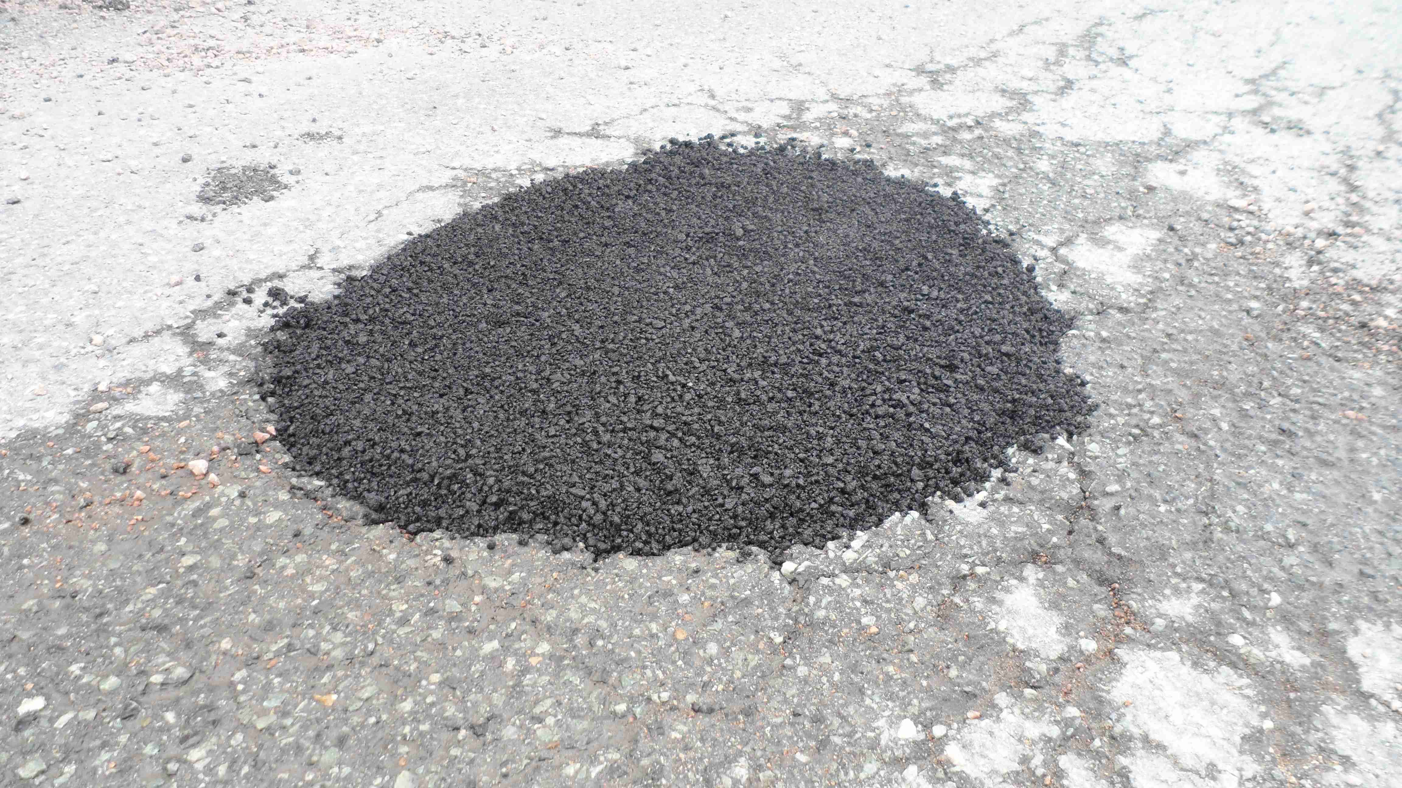 Legg asfalten med 3-4cm overhøyde
